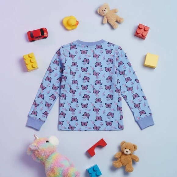 Blue Butterfly Kids Pajama Top – Back View with Cute Toys - Picture 4 of 5